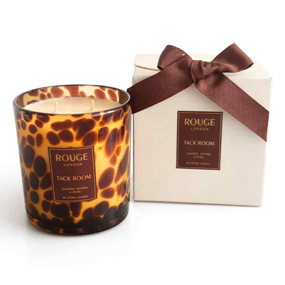 Tack Room Candle with a tortoiseshell pattern. Leather, Vetiver & Moss with luxury cream box and ribbon
