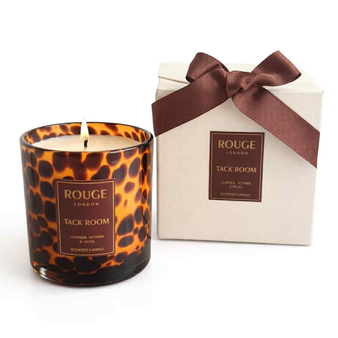 Tack Room Candle with a tortoiseshell pattern. Leather, Vetiver & Moss with luxury cream box and ribbon